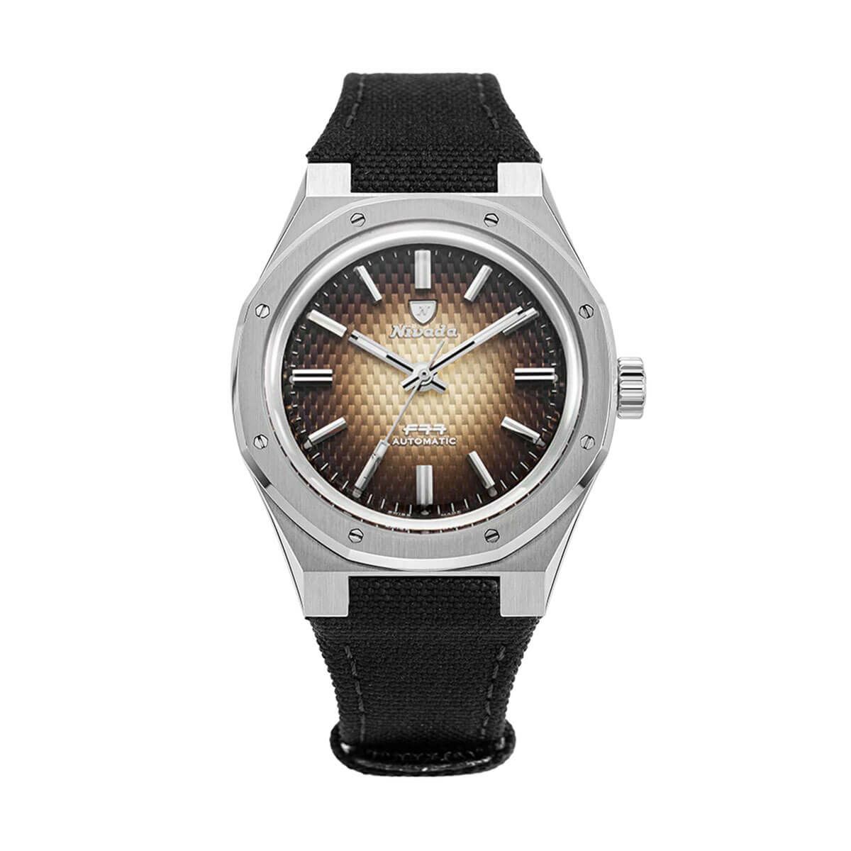 Nivada Grenchen / ニバダ グレンヒェン F77 ステンレススチール スモーク ダイヤル ノー デイト ブラック キャンバス ベルトの公式ECサイト掲載画像